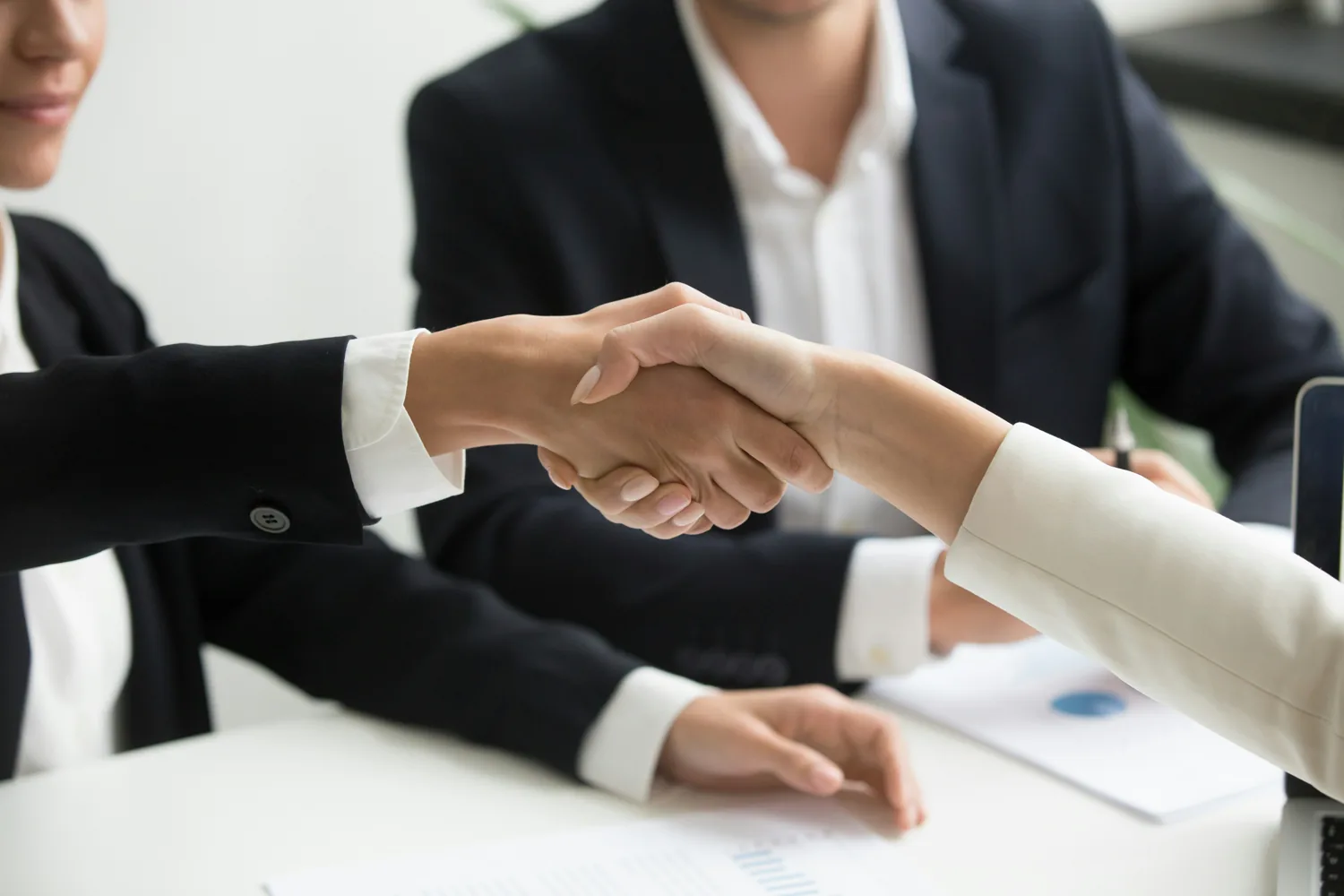 A confident professional handshake